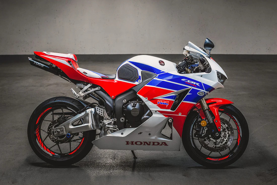 Modern sport bike parked in dramatic lighting